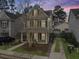 Charming home with inviting front porch, manicured landscaping, and a private driveway at 1747 Towne St, Johns Island, SC 29455