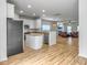 Modern kitchen with white cabinetry, stainless steel appliances, and an open layout at 1747 Towne St, Johns Island, SC 29455