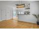 Open kitchen area featuring modern lighting, stainless steel appliances, and breakfast bar at 1747 Towne St, Johns Island, SC 29455