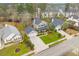 Aerial view of a home featuring a well-manicured lawn, and a detached garage at 186 Jupiter Ln, Summerville, SC 29483