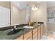 The bathroom features a large vanity with a built in sink, mirror, and vanity lighting at 186 Jupiter Ln, Summerville, SC 29483