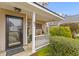 Charming covered front porch with seating and plants, providing curb appeal at 186 Jupiter Ln, Summerville, SC 29483