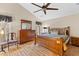 Spacious main bedroom featuring vaulted ceilings, wood furnishings, and a ceiling fan at 186 Jupiter Ln, Summerville, SC 29483