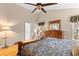 Spacious main bedroom with vaulted ceilings, wood furnishings, and walk-in bathroom at 186 Jupiter Ln, Summerville, SC 29483