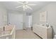Cozy bedroom with carpet, closet, dresser, and neutral decor offers a serene and organized space at 1901 Hubbell Dr, Mount Pleasant, SC 29466