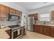 Updated kitchen with stainless steel appliances, granite countertops and wood cabinets at 1901 Hubbell Dr, Mount Pleasant, SC 29466