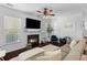 Comfortable living room featuring a fireplace, neutral decor, and hardwood floors at 1901 Hubbell Dr, Mount Pleasant, SC 29466