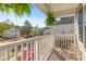 This porch has natural landscaping and neighborhood views at 1901 Hubbell Dr, Mount Pleasant, SC 29466