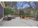 Cozy backyard with a patio, modern grill, a fire pit and chairs perfect for entertaining at 1942 Oak Tree Ln, Mount Pleasant, SC 29464