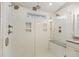 Luxury bathroom features a spacious shower with seat, tiled walls, and dual showerheads at 1942 Oak Tree Ln, Mount Pleasant, SC 29464