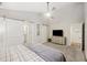 Spacious primary bedroom with high ceilings, sliding barn doors, and neutral decor at 1942 Oak Tree Ln, Mount Pleasant, SC 29464