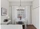 Light and bright dining room area with decorative chandelier at 1942 Oak Tree Ln, Mount Pleasant, SC 29464