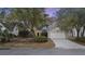 Lovely home with a two-car garage, front garden, and a well-maintained lawn at 1942 Oak Tree Ln, Mount Pleasant, SC 29464