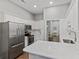 Eat-in kitchen with stainless steel appliances and island seating at 1942 Oak Tree Ln, Mount Pleasant, SC 29464