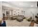Spacious living room with high ceilings, comfortable seating, and an open layout at 1942 Oak Tree Ln, Mount Pleasant, SC 29464