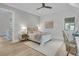 Bright bedroom with natural light, desk, and woven chair, perfect for relaxation at 215 Fell Pt, Daniel Island, SC 29492