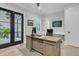 Home office features a large wooden desk and an outside view at 215 Fell Pt, Daniel Island, SC 29492