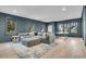 Spacious entertainment room with comfortable seating and ping pong table near the windows at 215 Fell Pt, Daniel Island, SC 29492