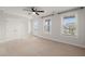 Expansive bedroom with ample natural light, carpeted floors, and a double door closet at 219 Seaworthy St, Summerville, SC 29486