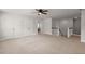 Large bedroom with neutral carpet, closet, and access to the staircase at 219 Seaworthy St, Summerville, SC 29486
