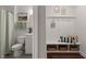 Welcoming entryway featuring a built-in bench with storage and a view of the nearby bathroom at 219 Seaworthy St, Summerville, SC 29486