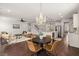 Open-concept living room flows into a modern kitchen with stainless steel appliances and a large island at 219 Seaworthy St, Summerville, SC 29486