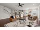 Open-concept living space with hardwood floors, flowing into the kitchen and dining areas, perfect for entertaining at 219 Seaworthy St, Summerville, SC 29486