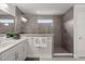 Modern bathroom shower with sleek gray tile and glass partition at 219 Seaworthy St, Summerville, SC 29486
