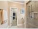 Bathroom featuring a tiled shower and a doorway leading to the closet space at 2217 Beckenham Dr, Mount Pleasant, SC 29466