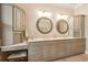 A well-lit bathroom features a double sink vanity, makeup vanity, storage, and neutral color palette at 2217 Beckenham Dr, Mount Pleasant, SC 29466