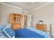 Bedroom with a bed, wooden dresser, and doorway leading to the hallway at 2217 Beckenham Dr, Mount Pleasant, SC 29466