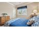 Bedroom with a gold bed frame, classic furniture and decor, and neutral walls at 2217 Beckenham Dr, Mount Pleasant, SC 29466