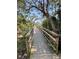 Scenic community boardwalk surrounded by lush foliage and providing access to outdoor spaces at 2217 Beckenham Dr, Mount Pleasant, SC 29466