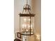 Large wrought iron and glass chandelier with multiple lights in a home's entryway at 2217 Beckenham Dr, Mount Pleasant, SC 29466