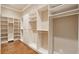 Walk-in closet with custom shelving and ample storage at 2217 Beckenham Dr, Mount Pleasant, SC 29466