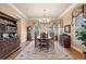 Elegant dining room with a chandelier and formal dining set at 2217 Beckenham Dr, Mount Pleasant, SC 29466