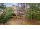 Beautiful home exterior with mature trees providing a serene and private setting at 2217 Beckenham Dr, Mount Pleasant, SC 29466