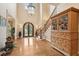 Stunning foyer featuring high ceilings, hardwood floors, and staircase at 2217 Beckenham Dr, Mount Pleasant, SC 29466