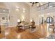 Open-concept living room features hardwood floors, neutral paint, and staircase to the upper level at 2217 Beckenham Dr, Mount Pleasant, SC 29466
