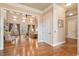 Bright and airy living room with hardwood floors, high ceilings, and a view to the outdoors at 2217 Beckenham Dr, Mount Pleasant, SC 29466