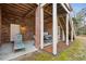 Outdoor patio area featuring brick columns, concrete flooring, and outdoor furniture, perfect for relaxing at 2217 Beckenham Dr, Mount Pleasant, SC 29466