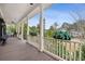 Inviting porch with classic white columns and green foliage at 2217 Beckenham Dr, Mount Pleasant, SC 29466
