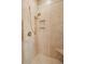 Tiled shower with stone-look wall and built in shelf at 2217 Beckenham Dr, Mount Pleasant, SC 29466