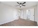 Neutral bedroom featuring a ceiling fan and wood-look flooring at 224 Legare Rd, Saint George, SC 29477