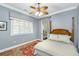 Inviting bedroom with natural light, wood floors, and neutral tones for a serene retreat at 2824 Old Drake Dr, Seabrook Island, SC 29455