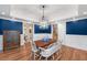 Dining room featuring blue accent wall and view of connected living spaces at 2824 Old Drake Dr, Seabrook Island, SC 29455