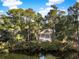 Beautiful exterior of a home surrounded by lush greenery and overlooking a tranquil body of water at 2824 Old Drake Dr, Seabrook Island, SC 29455