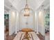 Grand foyer boasts marble floors, columns, and elegant lighting, setting a luxurious tone at 2824 Old Drake Dr, Seabrook Island, SC 29455