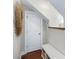 Hallway with a white storage bench and wood flooring at 2824 Old Drake Dr, Seabrook Island, SC 29455