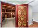 Home theater with tiered seating, patterned walls, and coffered ceilings at 2824 Old Drake Dr, Seabrook Island, SC 29455